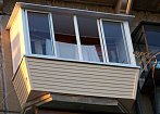Изготовление выноса позволит Вам увеличить внутреннее пространство балкона, а отделка сайдингом придает балкону законченный вид. mobile